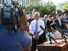 Governor Charlie Crist tossing the ball to Lance Block