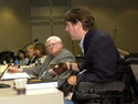 Commissioner J.R. Harding, right, discusses a recommendation from the board's Employment Committee.  Also shown, from left, are commissioners Jenny McNeely, Barbara Day, Carol Christopherson, and Bill Peeler