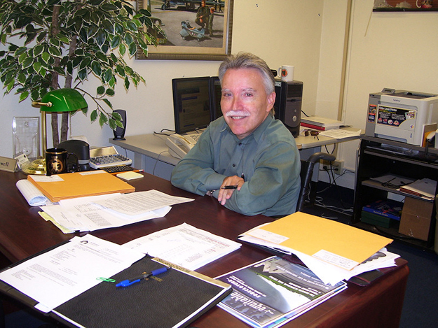 Dan Sowell works at his desk in the Bay County Property Appraiser's Office.  He'll be moving into a bigger office in January after being elected the county's property appraiser. 