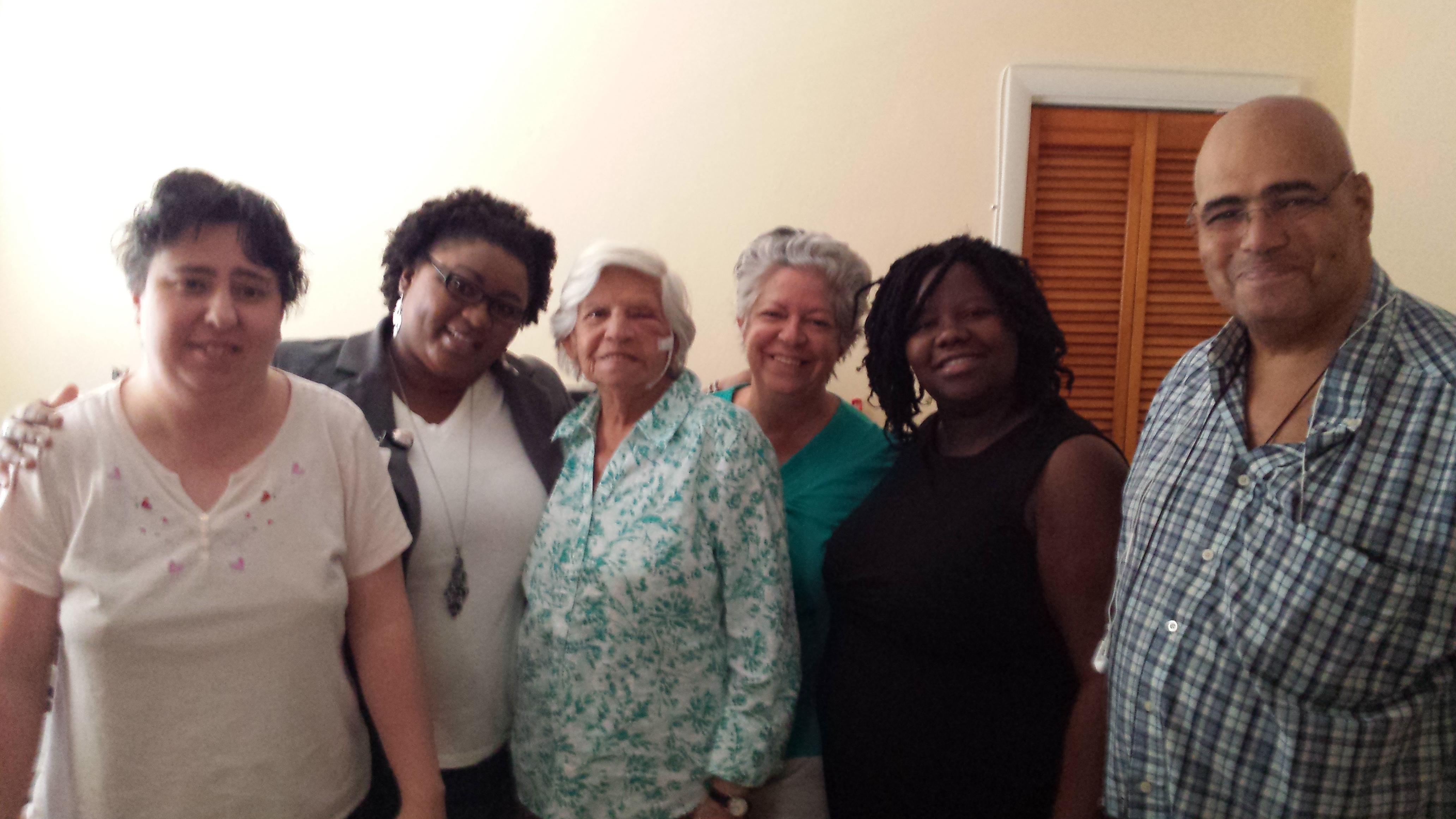 Left to Right:  Anabel, APD staff Kamicha Ferguson, Samuel’s grandmother, Ms. Aguilera Samuel’s mother, APD staff Martine Saint-Aime and APD staff Roland Vializ.  Not pictured – Hillary Jackson.