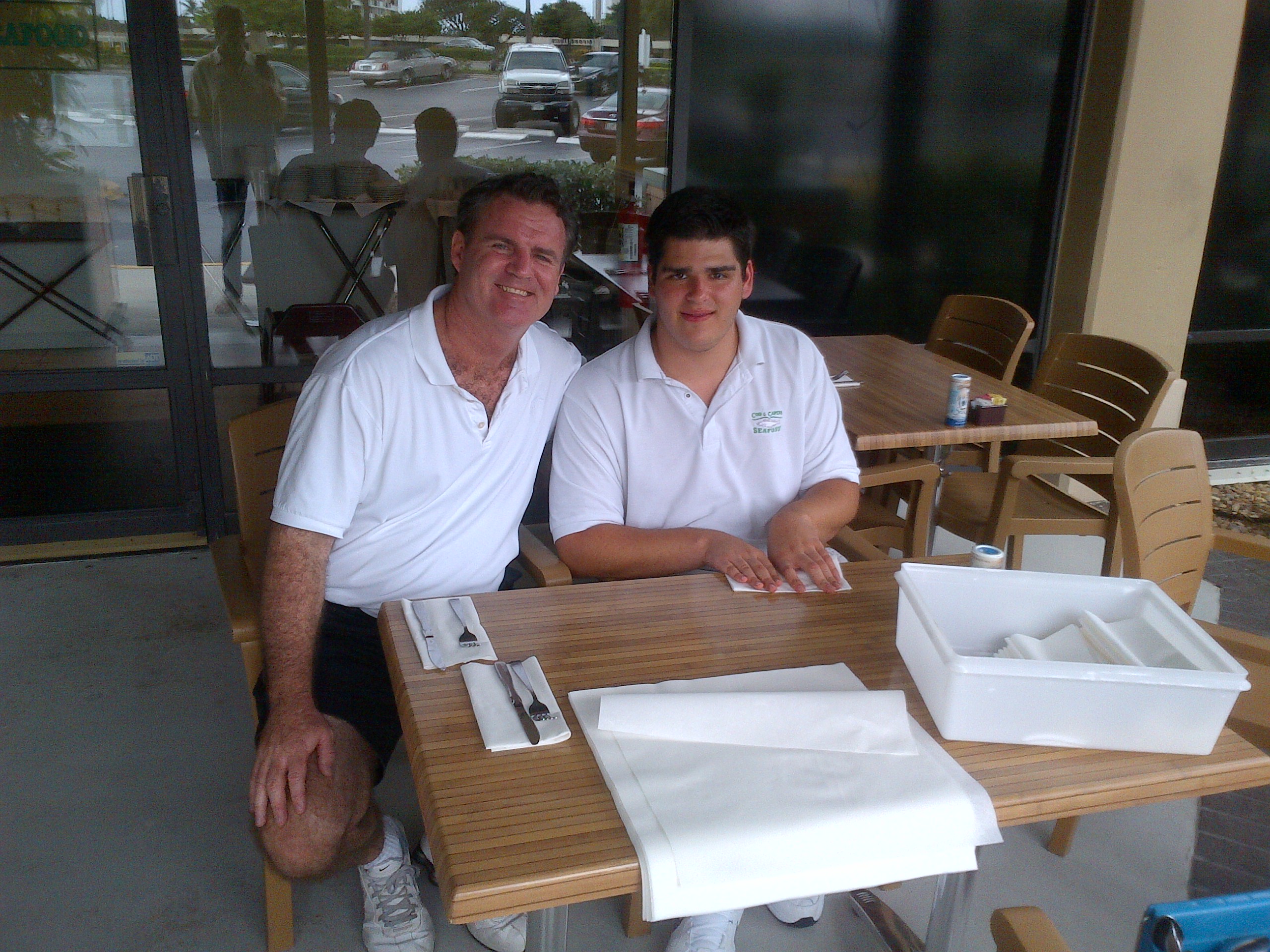 Job Assistant Tim Foley and Shaun Deason at Cod and Capers Seafood Café in North Palm Beach.
 