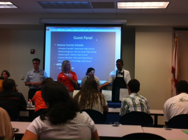 A panel of five employed individuals who receive APD services give job advice and answer questions.