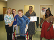 Kelly Michael is proud of his DMD certificate and his family at the Family Care Council Supported Employment Meeting on October 22