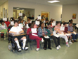 United Cerebral Palsy students receive their DMD certificates at an awards ceremony in Area 1