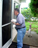 Mike Smith delivers a meal to a senior citizen as a volunteer and adult day program participant.