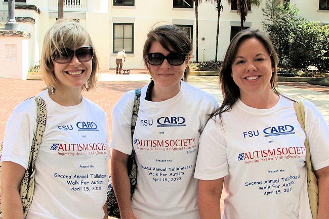 From left, Abby Vandegrift, Susie Williams, and Leah Simms represent Central Office in the Autism Walk, and have the T-shirts to prove it