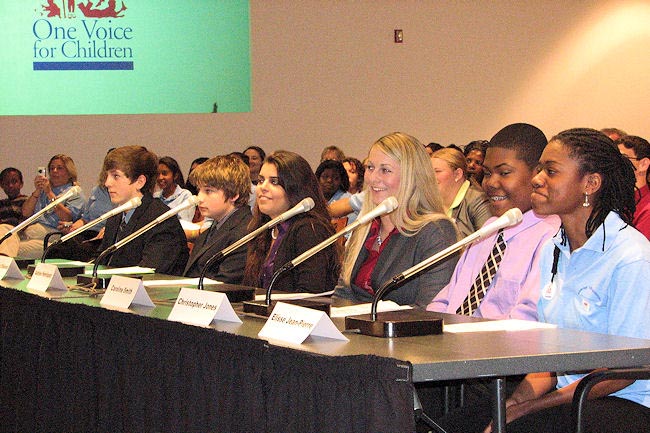 Student panelists share a humorous moment with members of the Florida Children and Youth Cabinet during the "Kids Only" Town Hall Meeting in Tallahassee