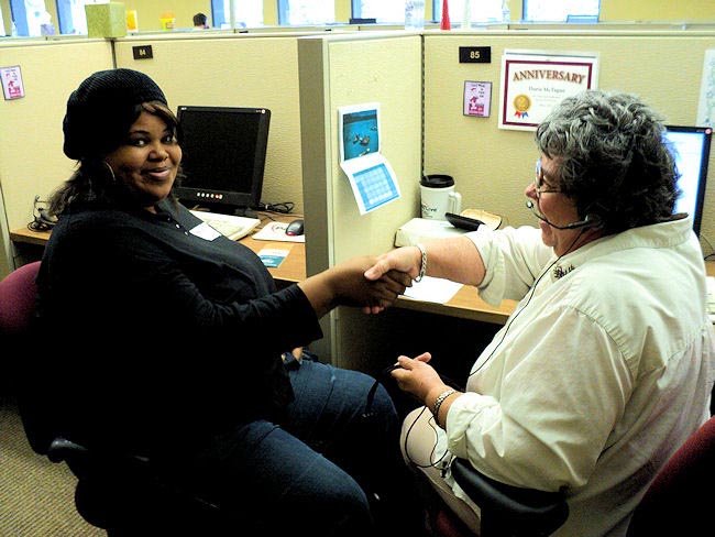 Mentee Annie Calhoun, left, thanks Doris McTague of the PATLive call center in Tallahassee for her job shadowing experience as part of Area 2's DMD activities