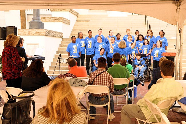 The crowd listens attentively to a performance by the Gretchen Everhart School Choir