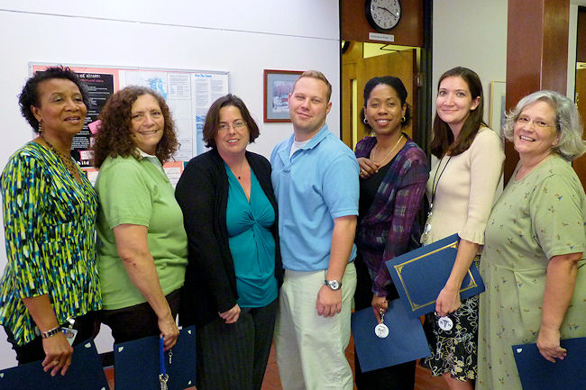 During National Nurses Week, APD's Suncoast Area Office recognizes its Medical Case Management Unit. From left, Martha Addison, nurse; Cheryl Clark, nurse; Michelle Tolini, supervisor; Blake Jordan, staff assistant; and nurses Pam Lassiter, Tanya Scheeler, and Kathy Freeman.