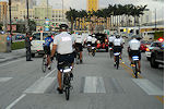 Officers of the Miami Police Department take off from Downtown Miami on May 2 on a 280-mile bike ride to raise funds for an accessible van for Angelyn Gutierrez, a waiting list customer.