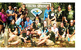 A happy group of students with disabilities, AmeriCorps members, and representative of partner agencies gather for a fun-filled day of service at Wekiwa Springs State Park, sponsored by Project Impact.