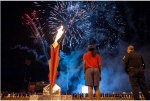Spectators watch the fireworks show at the Special Olympics Opening Ceremony.