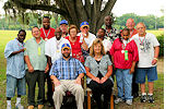 Sunland Superintendent Bryan Vaughan and Assistant Superintendent Darlene See, seated, congratulate the twelve Sunland athletes that took part in 2012 Florida Special Olympic Summer Games. They are, from left, front row, Willie Carter, Charles Sesser, Floyd Nelson, Cheryl Davison, Vickie Paige, Connie Swain, and Richard Pelz. Back row, from left, Michael Scott, Bennie Ryals, Richard Rummell, Andy Johnson, and Michael Painter.