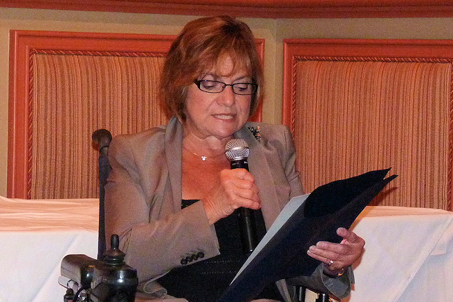 Sandra Sroka, Hillsborough County ADA coordinator, reads the proclamation from the Hillsborough County Commission declaring November 1 as Disability Mentoring Day.