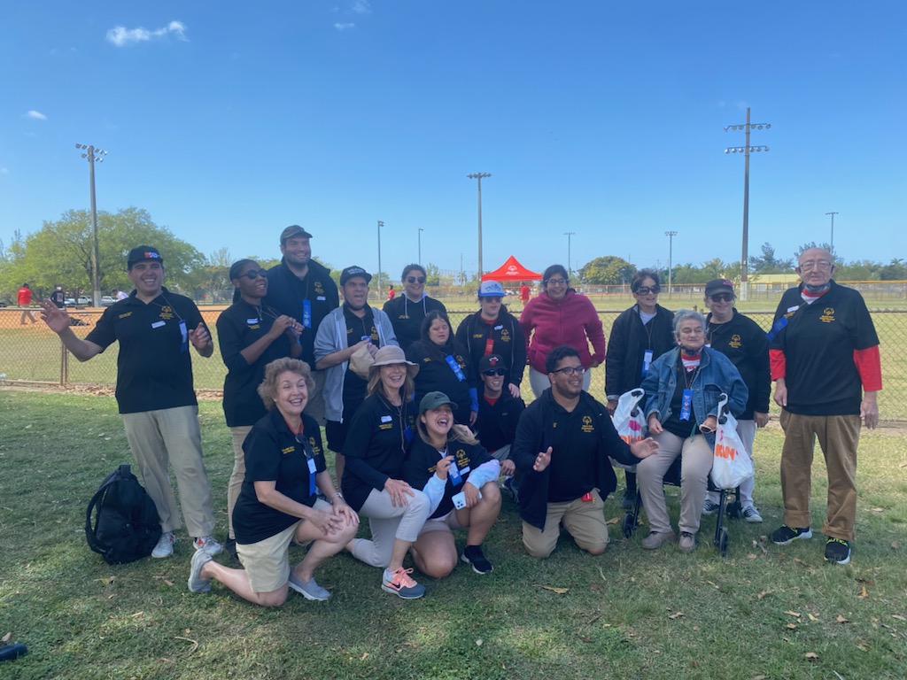 Residents of Castanedes Group Home pose for a photo at the Special Olympics.